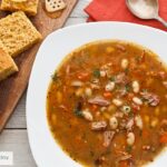 Bean soup recipe with smoked turkey, including stove top, slow cooker, and pressure cooker methods.
