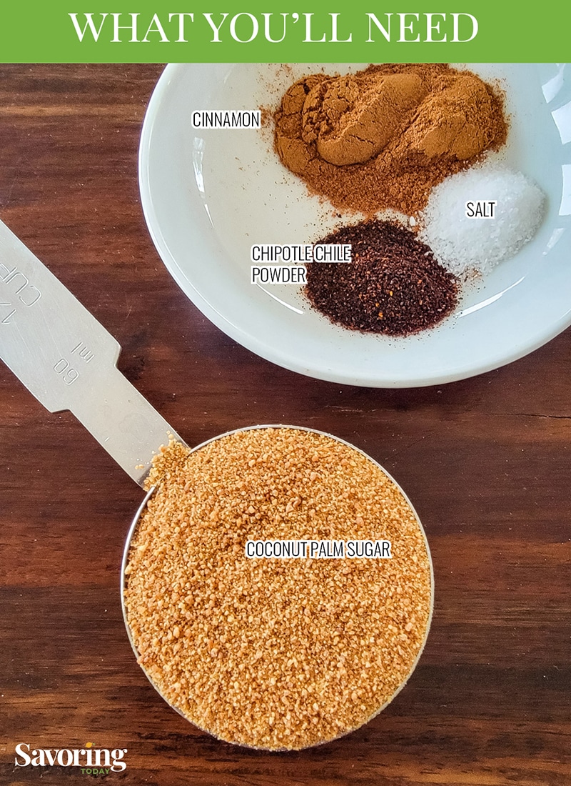 coconut palm sugar in a measuring cup by a saucer with cinnamon, salt, and chipotle powder