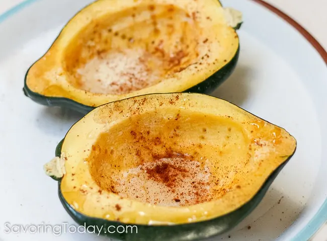 Maple syrup, cinnamon, and nutmeg bring out the natural goodness in acorn squash like nothing else in this simple acorn squash recipe.