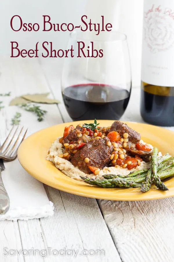 Osso Bucco-Style Beef Short Ribs Recipe is served over mashed cauliflower and a side of roasted asparagus. Leftovers make amazing beef vegetable soup too. 