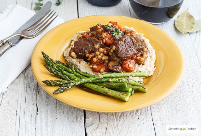 Osso Buco-Style Beef Short Ribs is a delicious recipe for family dinners around the table.