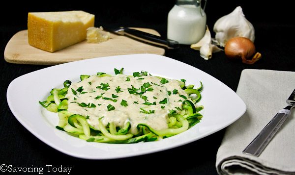 Classic alfredo sauce over spiralized zucchini noodles. Low carb and delicious!