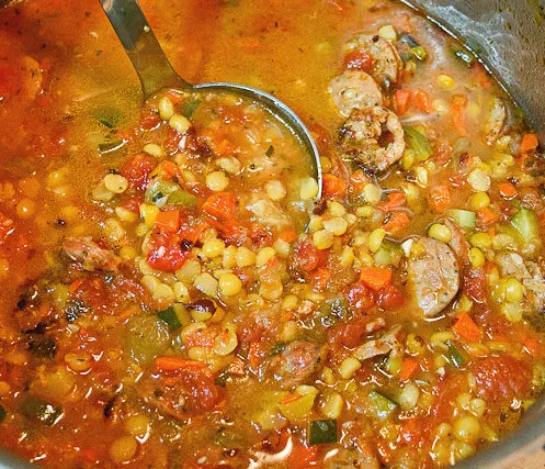 Simmer a pot of Sausage and Split Pea Stew for a hearty winter meal. Easy to make and satisfying.