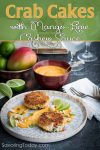 crab cakes served with mango lime sauce on a grey plate with two forks