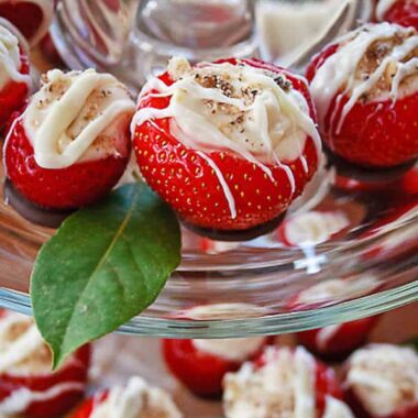 Strawberries stuffed with cheesecake filling and drizzled with chocolate. Just for two, Valentine's date night dessert.