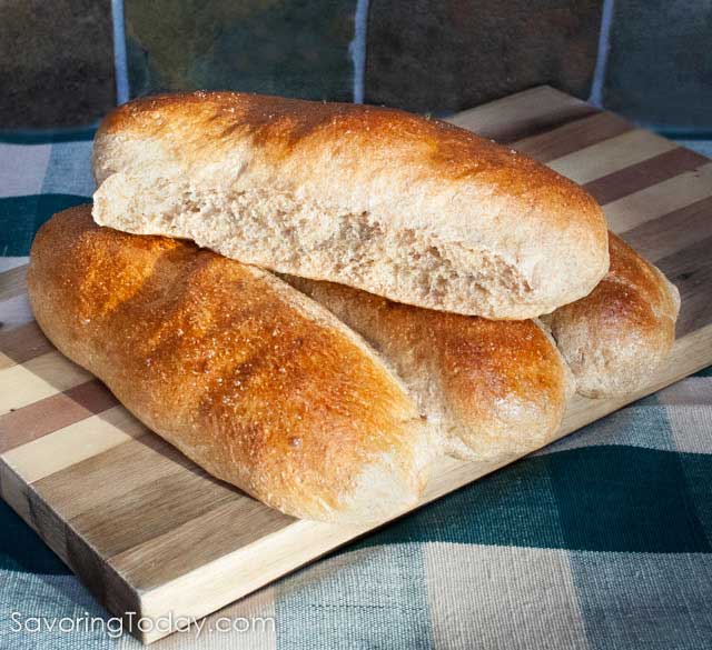 Sprouted Whole Wheat Hot Dog Buns on a cutting board.