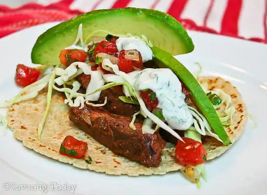 Grilled Chile-Lime Skirt Steak Tacos with fresh avocado and Pico.