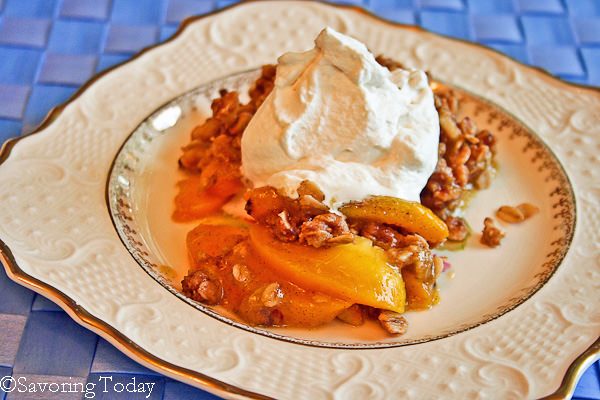 Sweet, ripe grilled peaches in a vanilla bean sauce tucked under a crunchy, nutty topping. The best of grilled summer desserts.