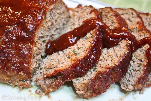 Learn to make the best meatloaf ever by taming the onions and add-ins. This meatloaf with sweetly-spiced glaze is crave-worthy comfort food.