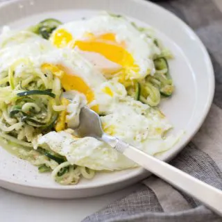 Get your vegetables early in the day with spiralized zucchini and creamy centered eggs.