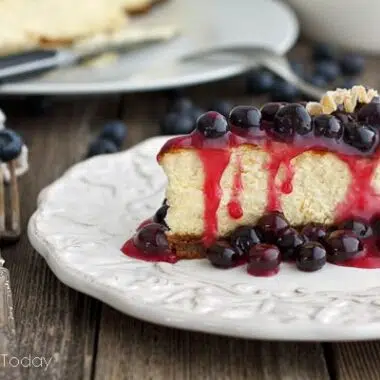 Rich and dense cheesecake recipe with blueberry topping for very special occasions.