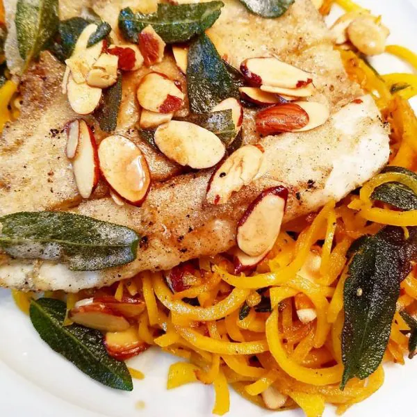 Butternut Squash in Almond and Sage Browned Butter as a bed for pan-seared fish is a delicious and healthy recipe done in under 30 minutes. 