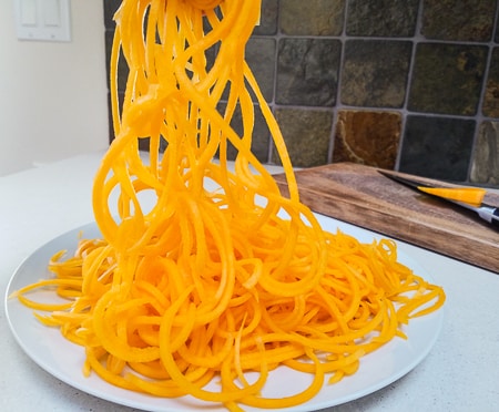 Butternut squash noodles made with a spiral slicer. Low carb noodles for any favorite sauce.