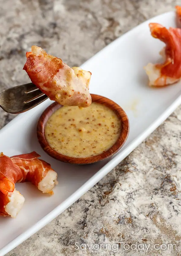 Prosciutto wrapped shrimp dipped in smoky stone ground honey mustard sauce for the win! Serve this recipe for any party or celebration.