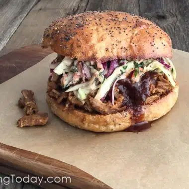 A Grilled Pulled Pork Sandwich Recipe that helps you get more smoke flavor from your gas or charcoal grill.