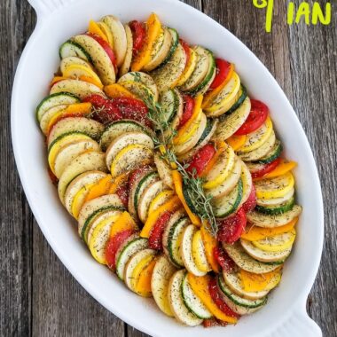 Vegetable Tian is an easy vegetable side dish recipe for holiday meals or potluck dinners. This beautiful gratin always brings the WOW!