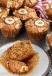 Banana muffins made with sprouted whole wheat, served on a white plate