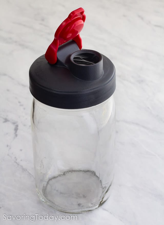 Wide mouth quart jar with pour spout lid.