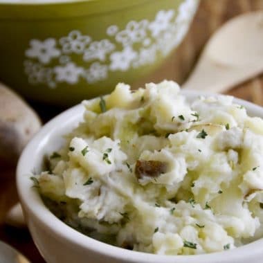 Easy and delicious, this Irish-inspired Garlic Parmesan Colcannon is a great addition to any meal, or even a simple meal in itself!