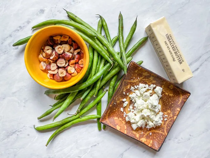 Butter, hazelnuts, green beans, and goat cheese—simply delicious side dish ingredients.