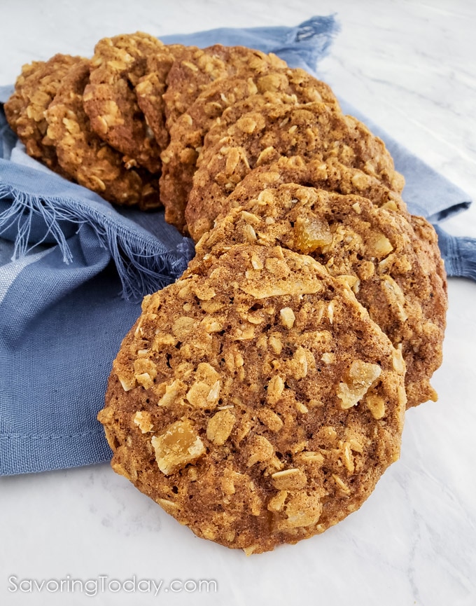 Ginger Oatmeal Cookies Stacked High on a Blue Towel