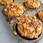 Pumpkin pie spice muffins in a tin from the oven.
