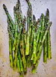 a pan of cooked asparagus