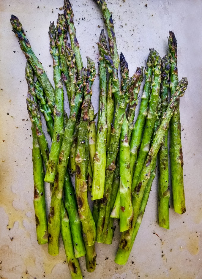a pan of cooked asparagus