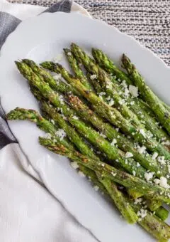 grilled asparagus served with cotija cheese