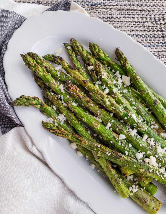 grilled asparagus served with cotija cheese