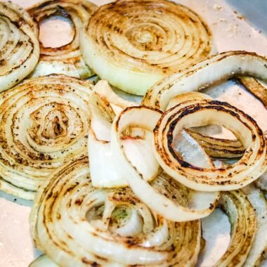 grilled onions on a tin tray