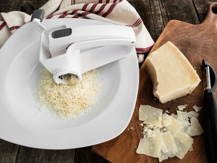 grated parmesan in a bowl with the grater