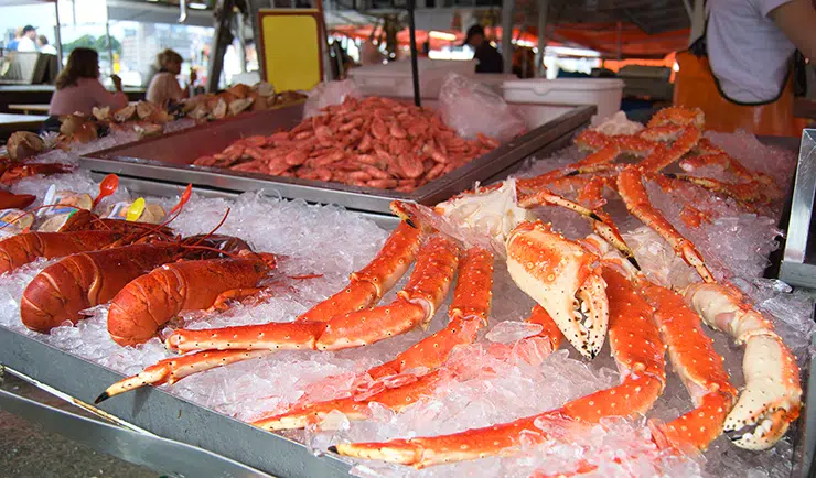 crab legs on ice at the market