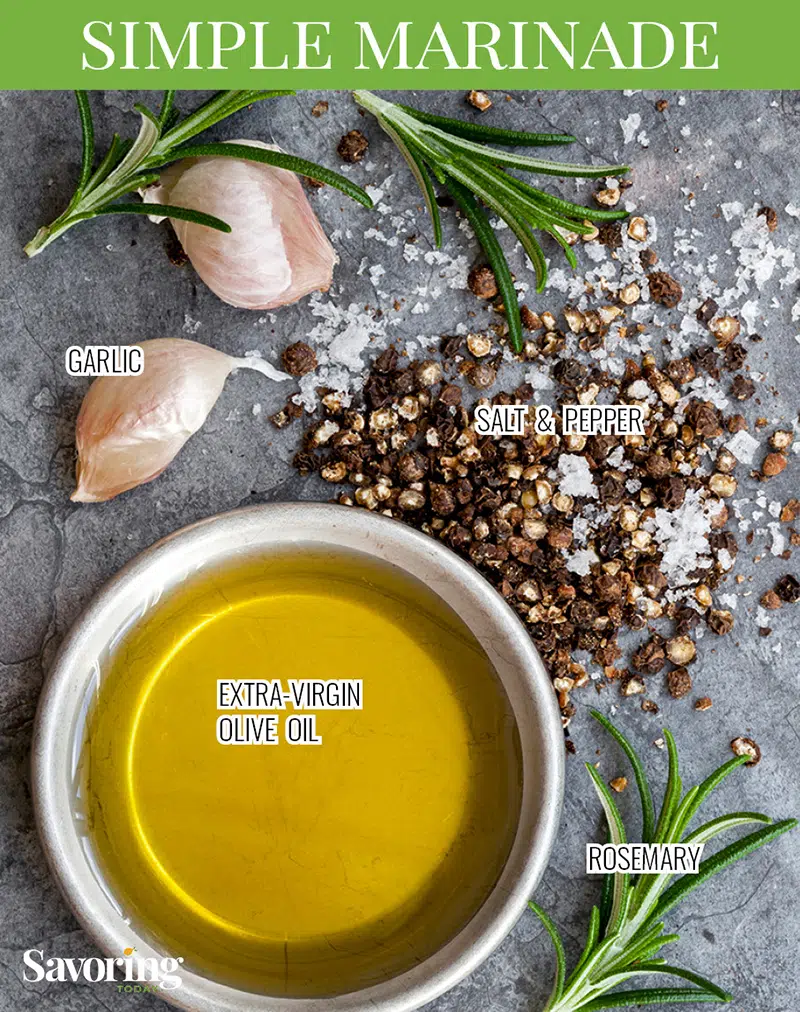 Olive oil, rosemary, garlic, salt and pepper on a grey background