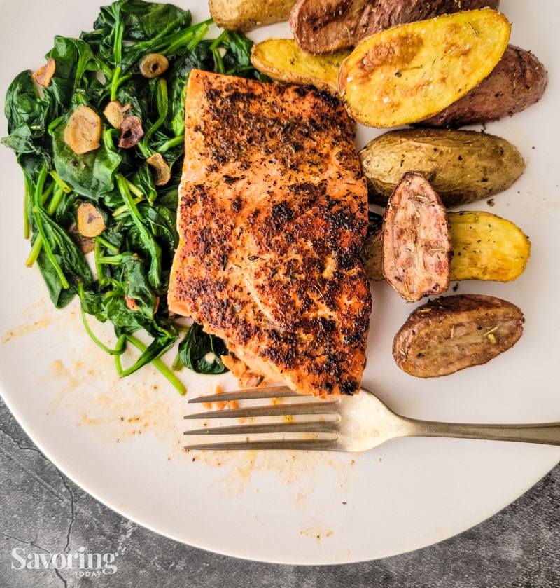 Salmon on a plate with a bite taken out