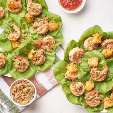 Shrimp wraps on a platter with dipping sauce