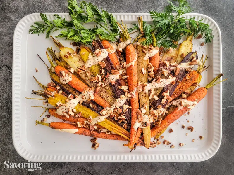 roasted carrots on a white tray
