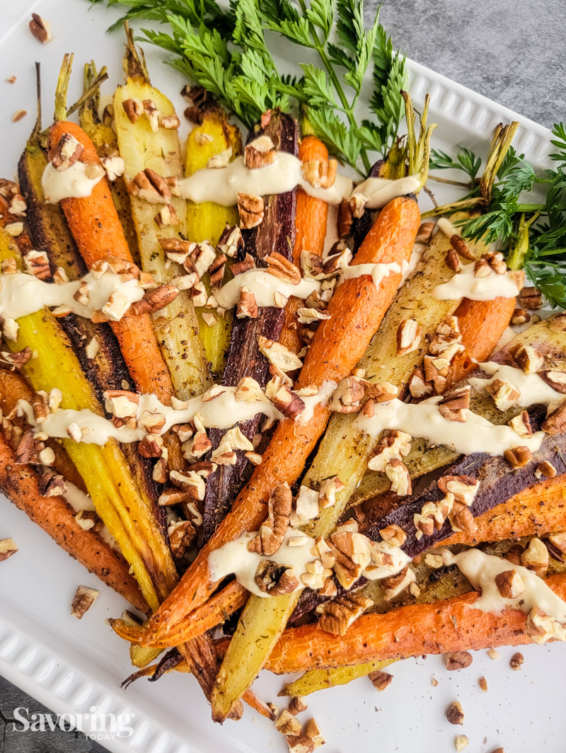 roasted carrots dusted with sumac drizzled with yogurt sauce