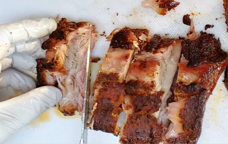 cutting ribs into smaller servings