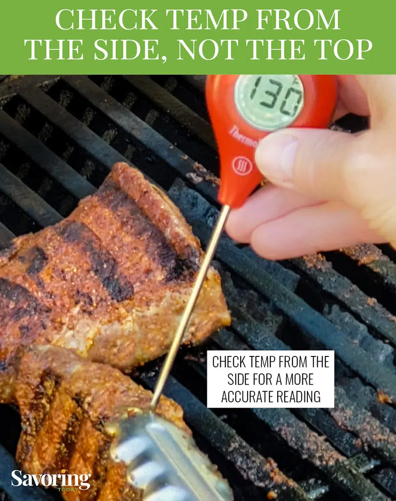 checking steak temp with a thermometer