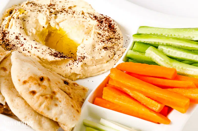 hummus sprinkled with sumac and served with crudites