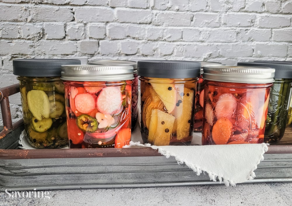 homemade quick pickles set in a tin