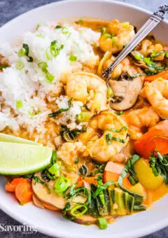 Shrimp and vegetables in a red curry sauce with rice