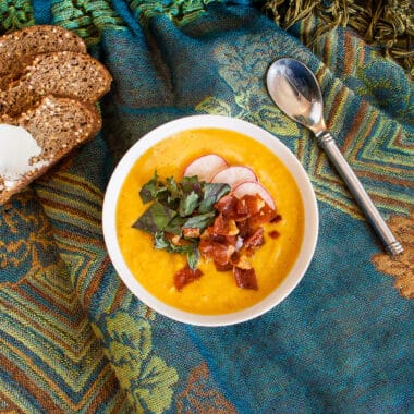 curry butternut soup on a blue scarf