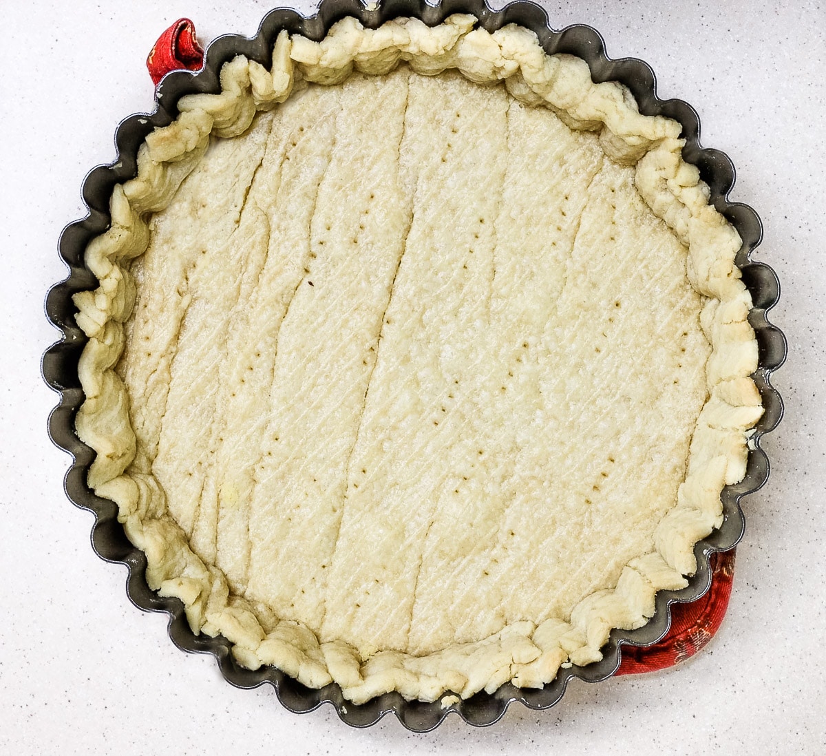 store bought pie crust par-baked in a tart pan