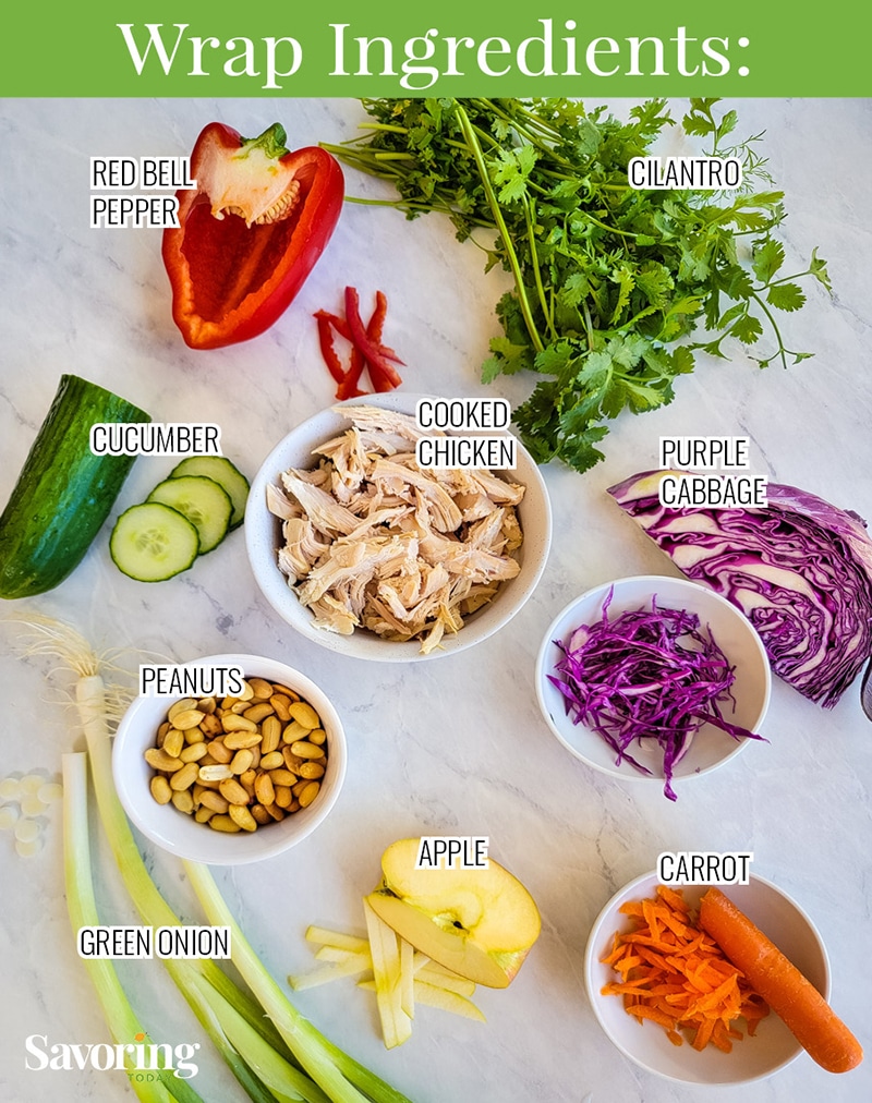 Asian Chicken Wrap ingredients in bowls on a marble table