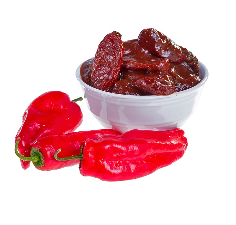 chipotle peppers in adobo sauce in a white bowl