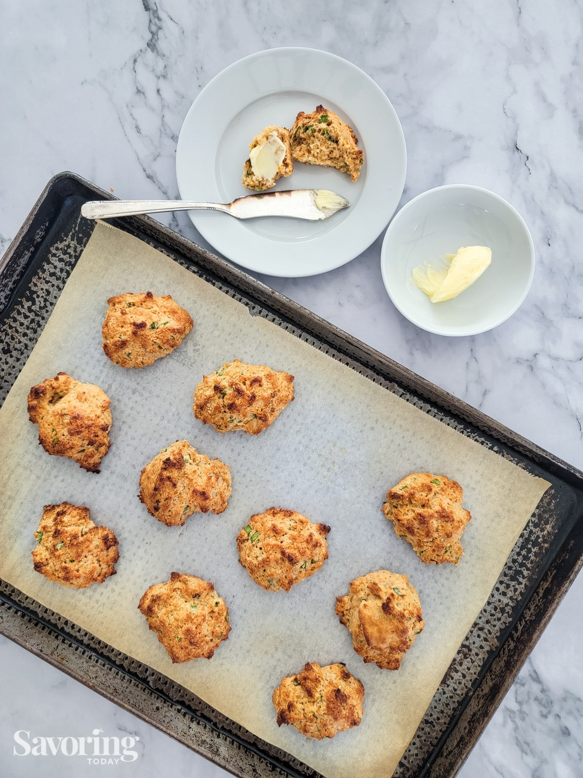 buttermilk drop biscuits fresh from the oven on a pan