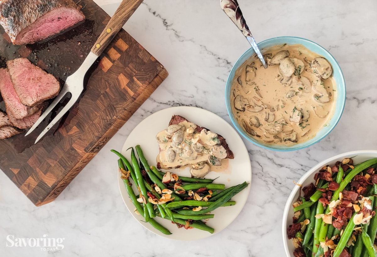 mushroom ragout served over roasted meat with green beans