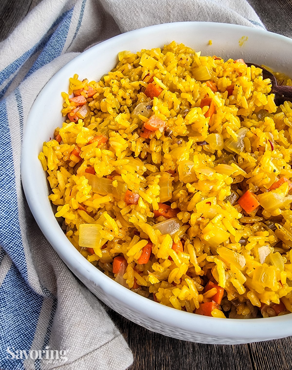 https://savoringtoday.com/wp-content/uploads/2023/10/saffron-rice-served-close-up.jpg